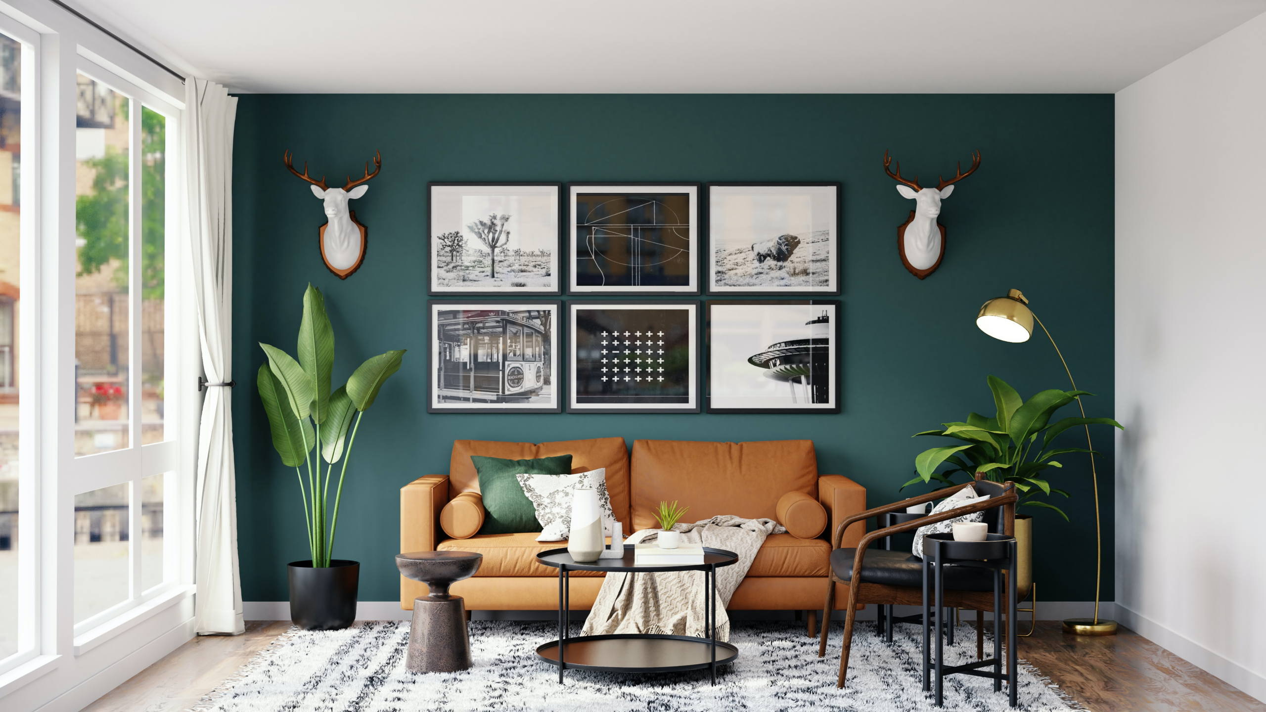 vacation rental decorating ideas in a living room decorated with wall art, brown leather couch, accent chair, ccoffee table, standing light, faux plants, and a cozy blanket that makes it feel like hom